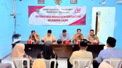 Bhabinkamtibmas Desa Sukanagara Hadiri Rapat Anggota Tahunan Koperasi Merah Putih