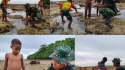 Personel Satgas TMMD Bermain dan Mencari Ikan Bersama Anak-anak Saat Air Laut Surut Personel Satgas TMMD Bermain dan Mencari Ikan Bersama Anak-anak Saat Air Laut Surut