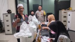 Bhabinkamtibmas Polsek Cikupa Amankan Penyaluran Bantuan Pangan Kemensos di Desa Bitung Jaya
