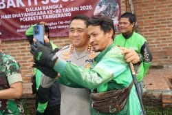 Sambut Hari Bhayangkara, Polresta Tangerang Baksos Bareng Komunitas Ojol