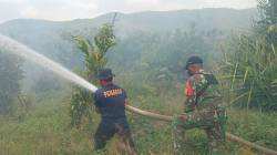 Babinsa Koramil Maba Turun Tangan, Cegah Api Meluas di Lahan Warga